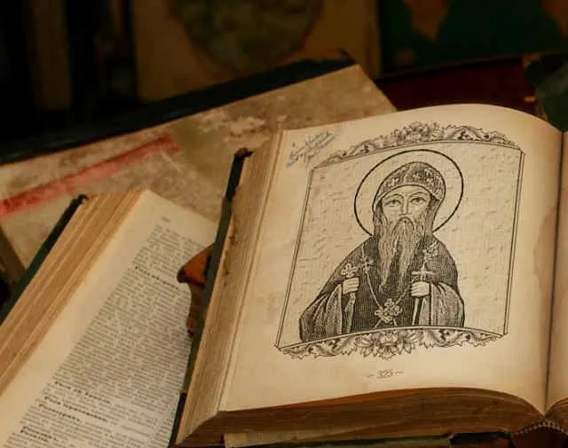 An engraving of the saint in an old book
