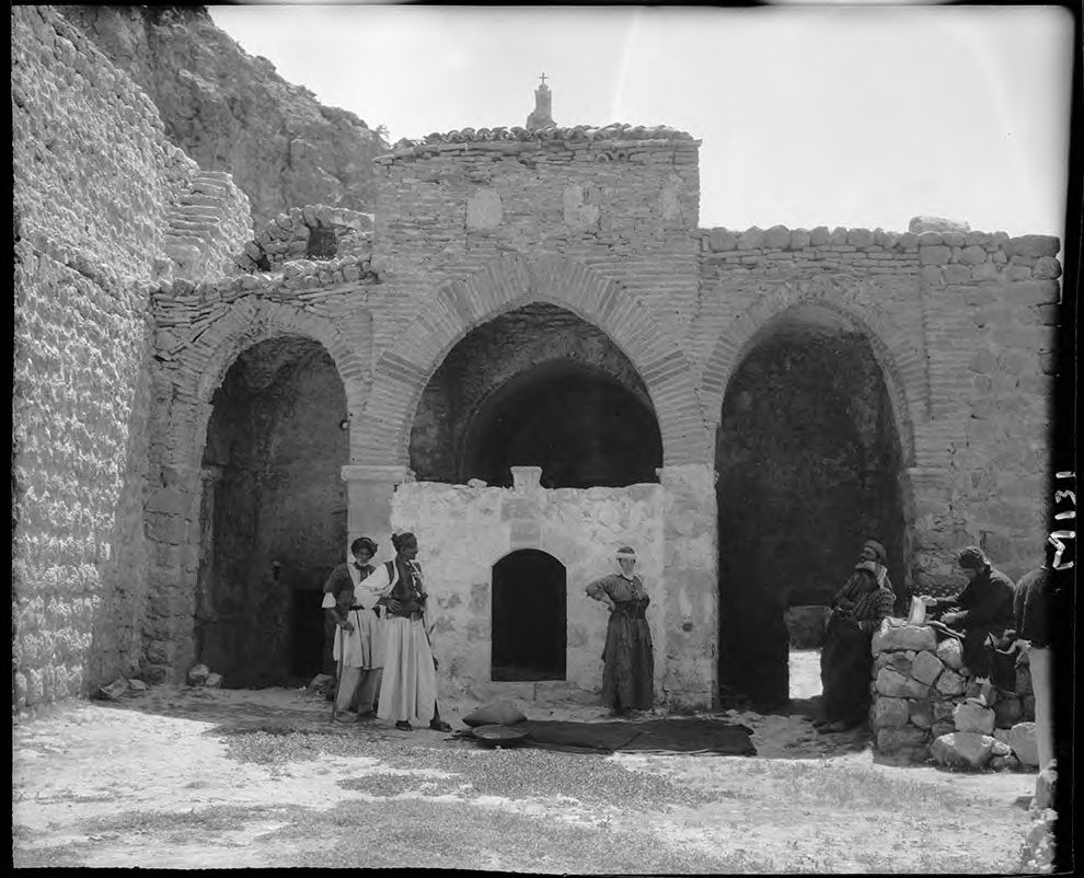 The brick arches of the courtyard